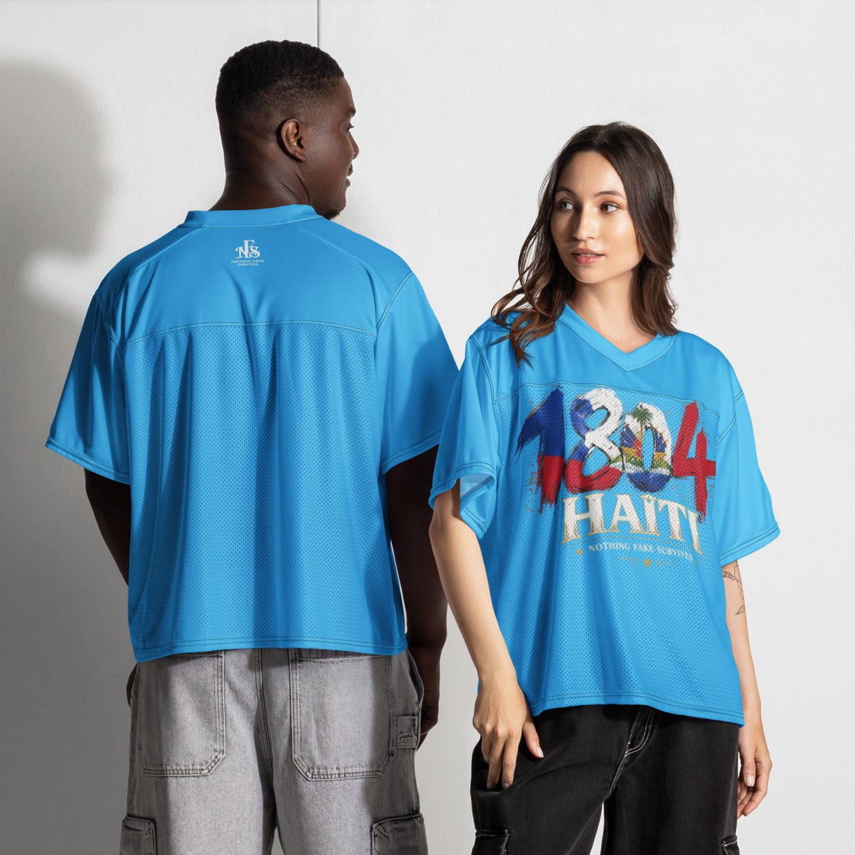 Oversized Caribbean Sky blue 1804 Haiti boxy jersey by NFS shown on male and female models