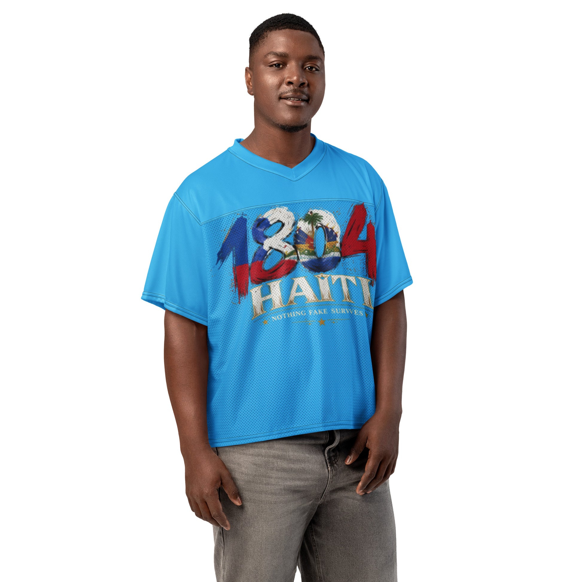 Man wearing Caribbean Sky blue oversized Haiti 1804 football jersey by NFS