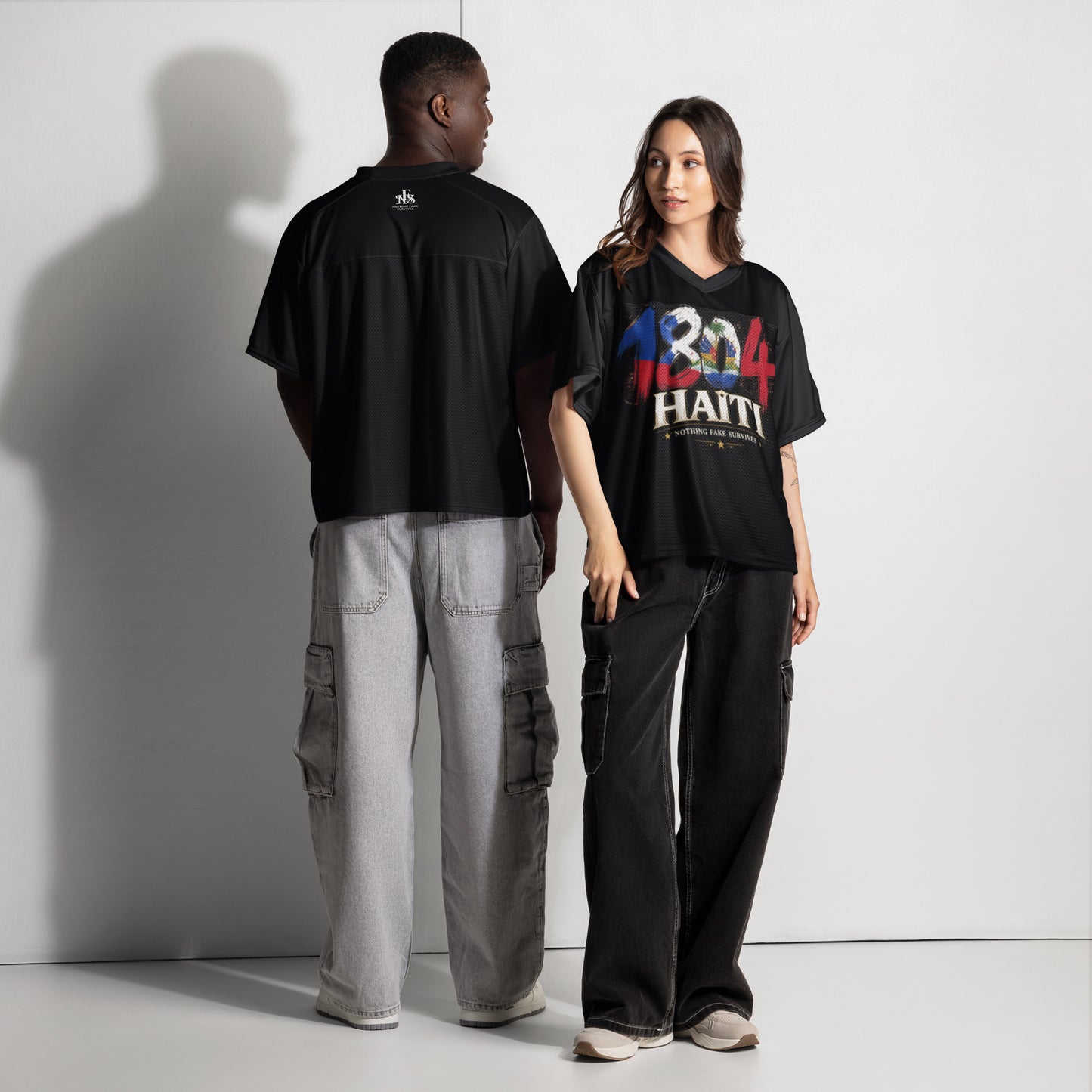 Oversized Midnight Black 1804 Haiti boxy jersey by NFS shown on male and female models