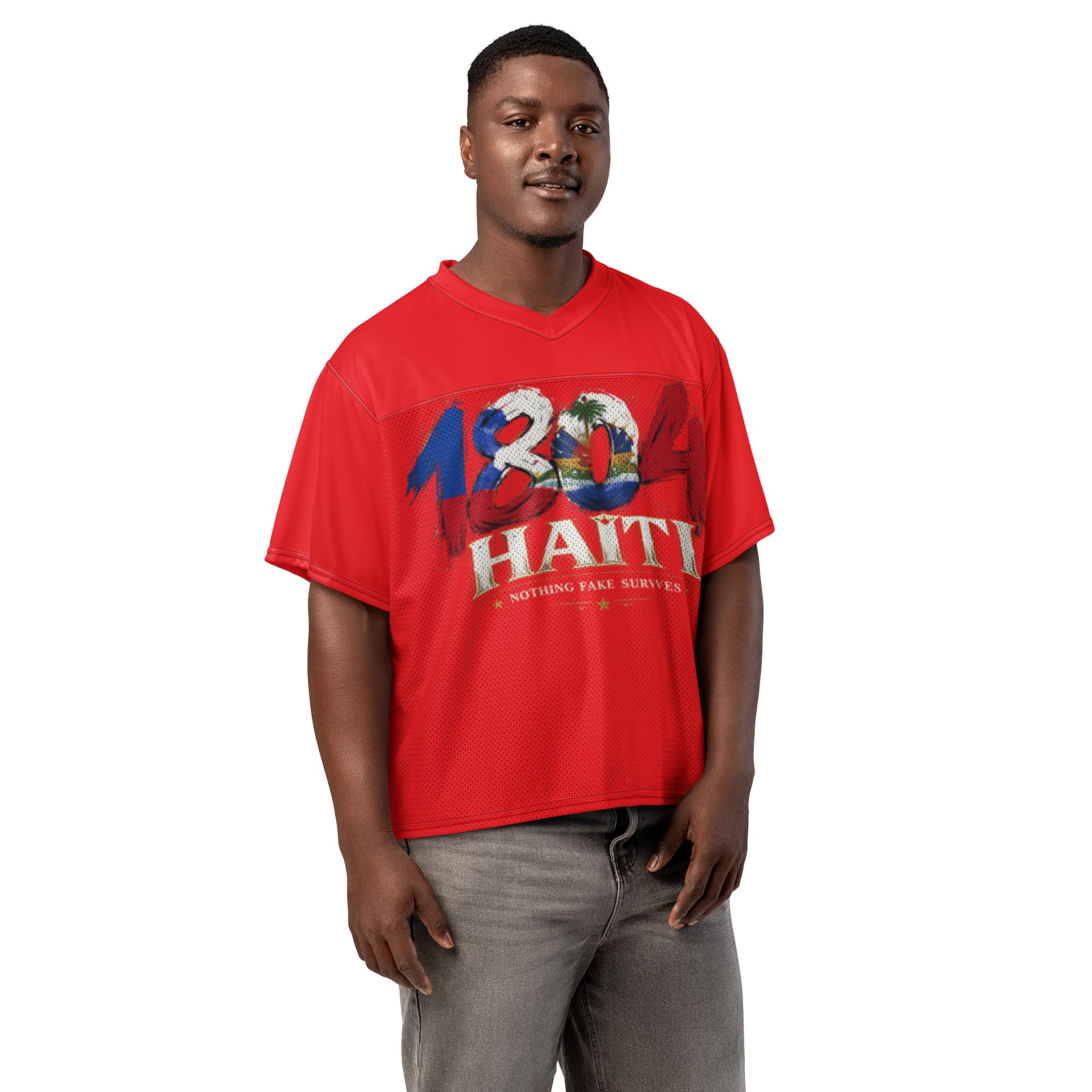 Man wearing Revolution Red oversized Haiti 1804 football jersey by NFS