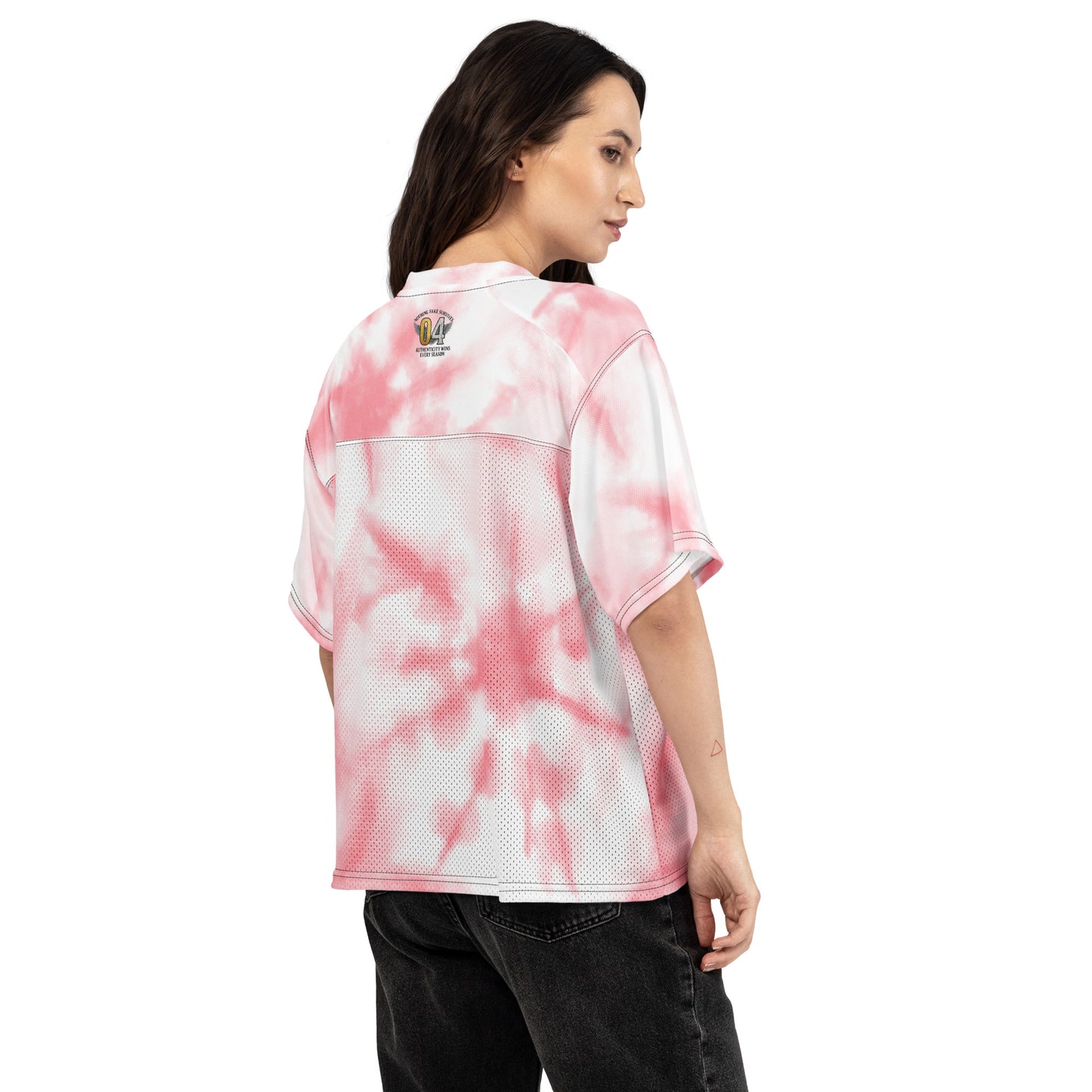 Person wearing a pink and white NFS tie-dye sports jersey 
