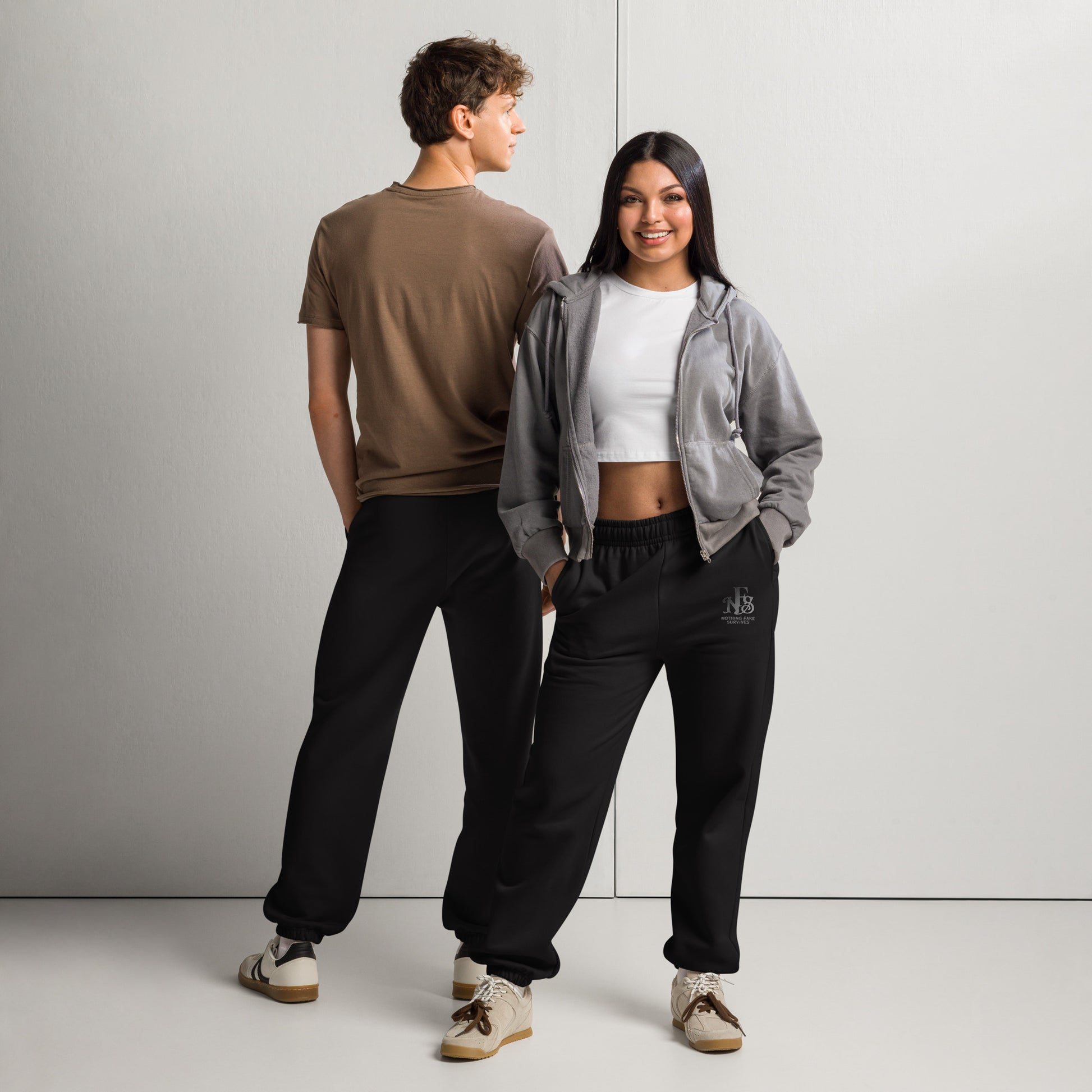 Black embroidered sweatpants with NFS logo on thigh.